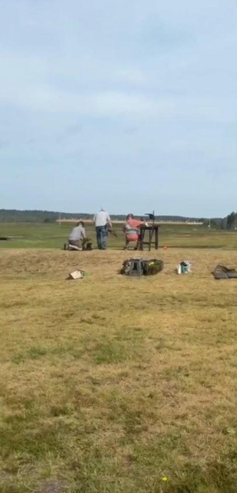 Members shooting on the range at Bisley